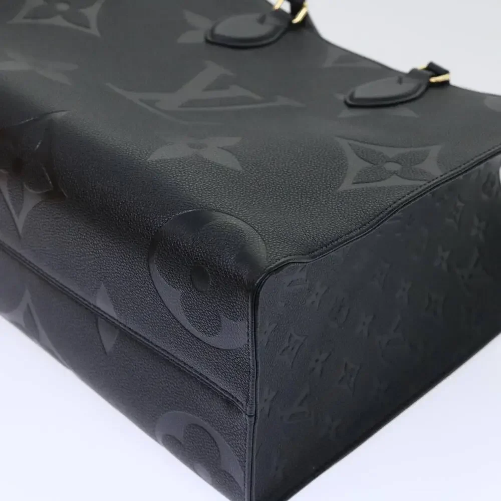 LOUIS VUITTON Monogram Empreinte On The Go MM Bag Black M45595